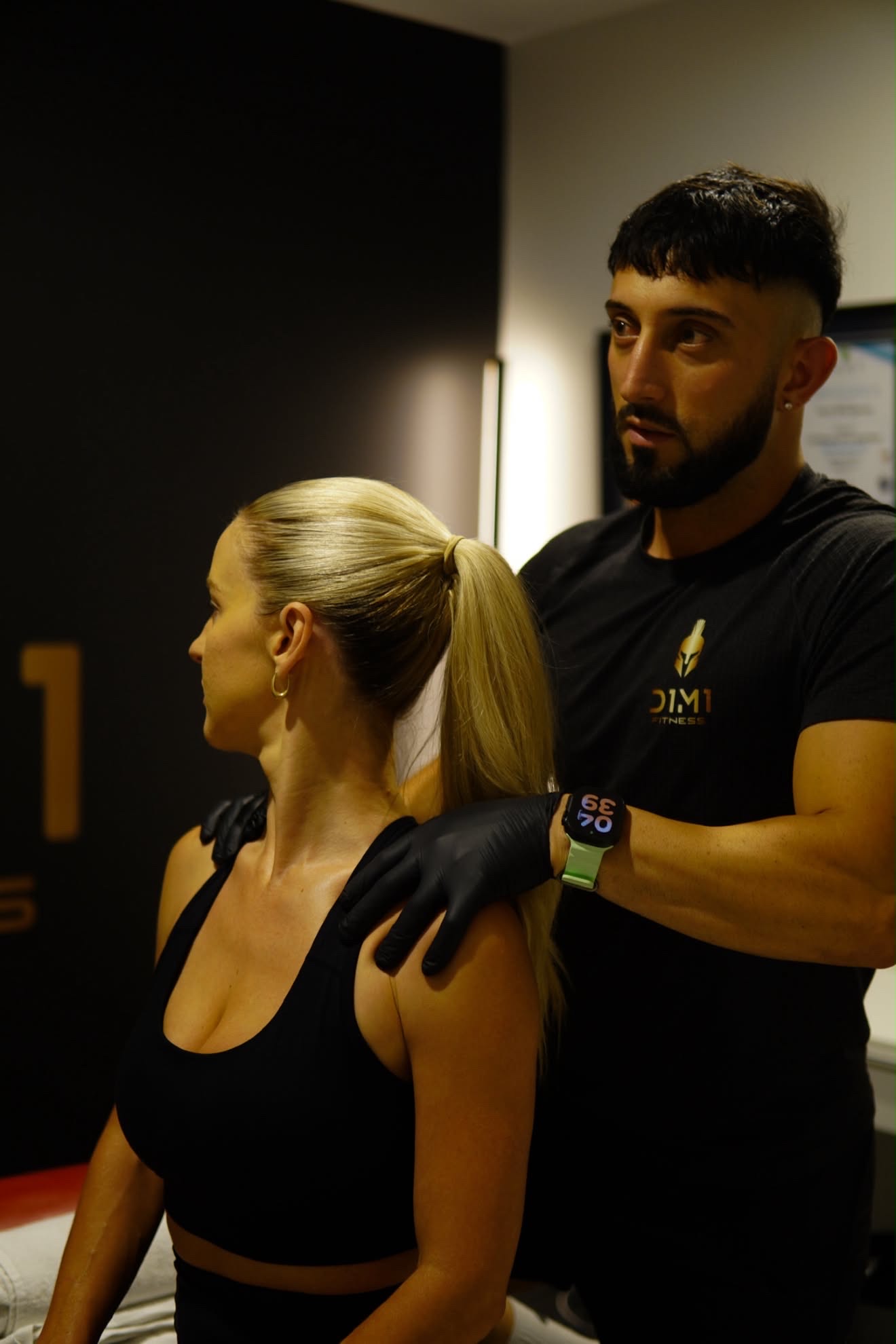 Shoulder assessment before treatment at D1M1 Fitness